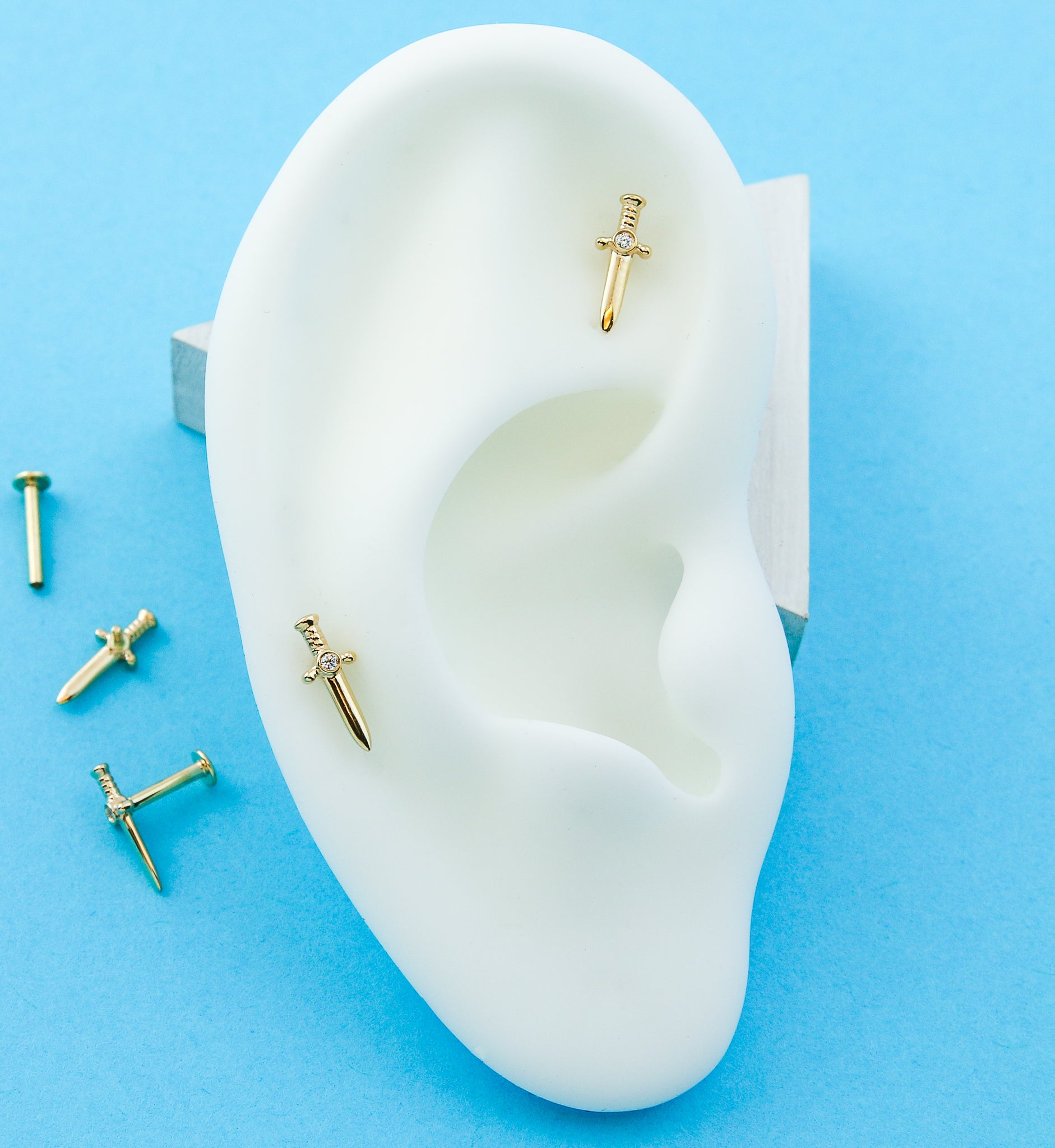 14kt Gold Dagger Clear CZ Internally Threaded Labret