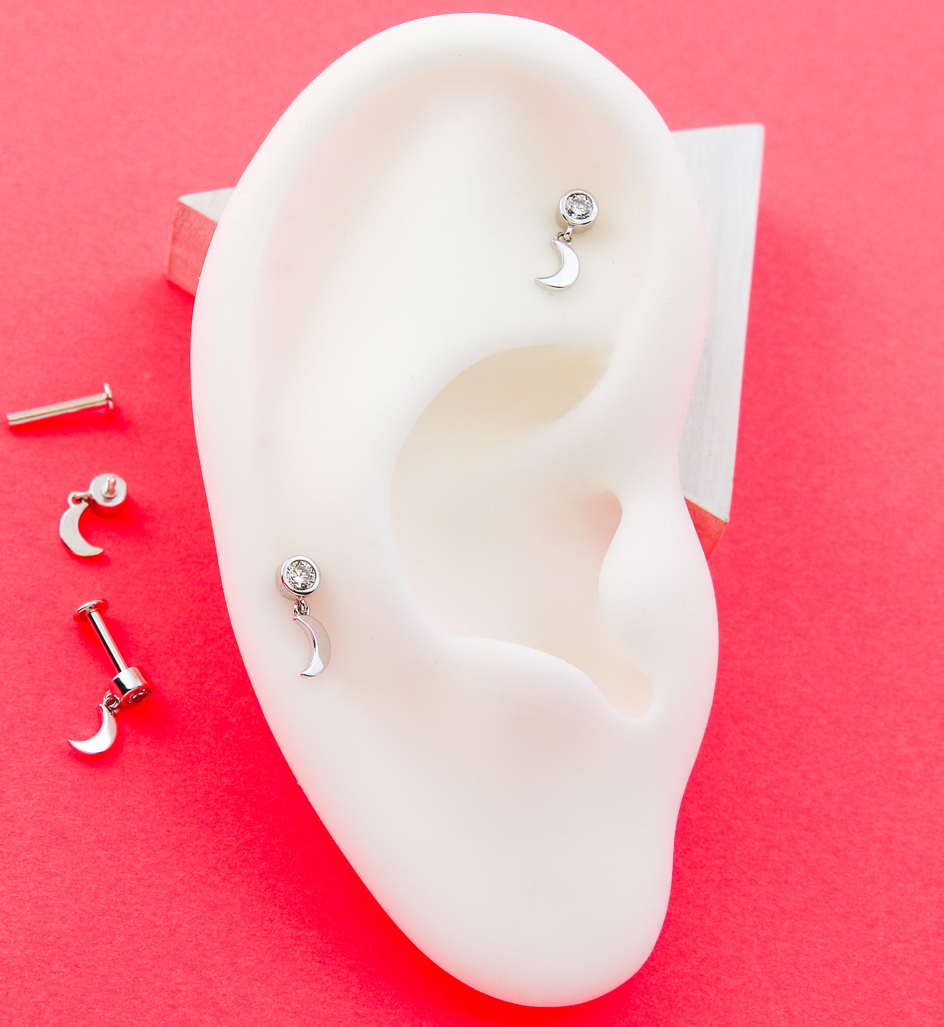 14kt White Gold Dangle Half Moon Clear CZ Internally Threaded Labret