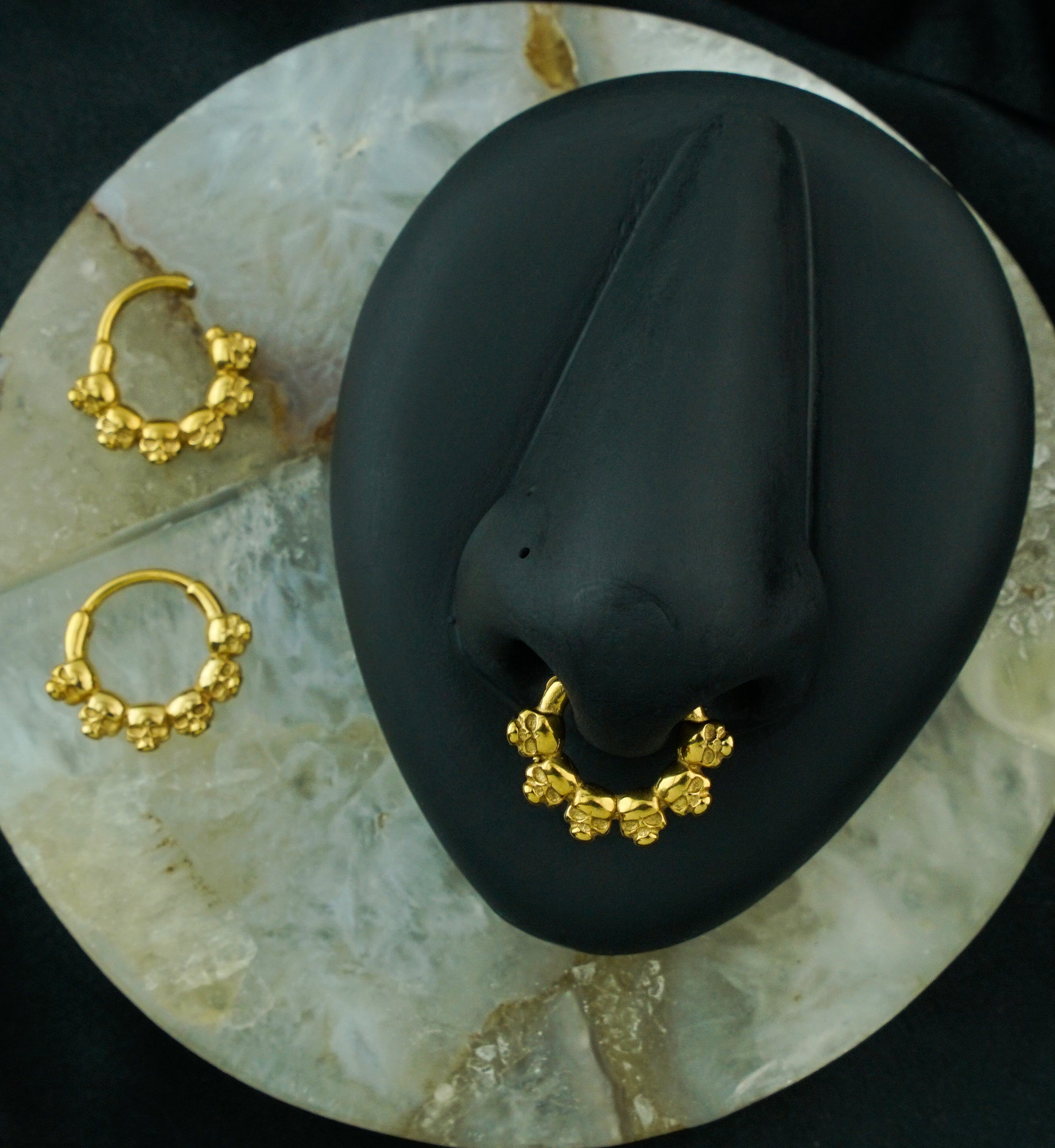 Gold PVD Ring Of Skulls Stainless Steel Hinged Segment Ring