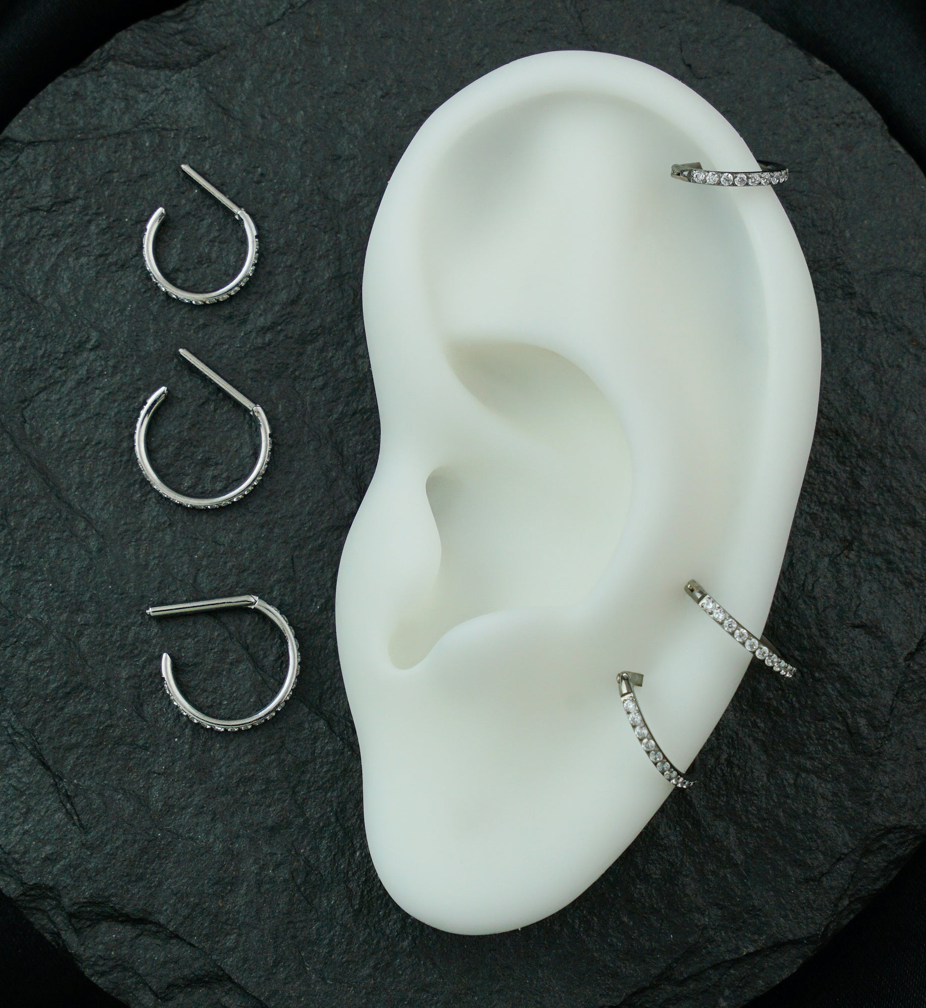 Outward Facing Deca Clear CZ Titanium D-Shaped Hinged Segment Ring