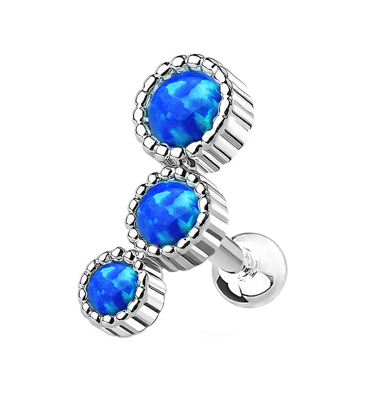 Size: 16 gauge 316L stainless steel barbell Brass opal setting NOTICE: Brass is not meant for long term wear. May oxidize under certain moisture conditions Synthetic opalite gems Bar length is 1/4". Height is: 10mm Ball: 3mm