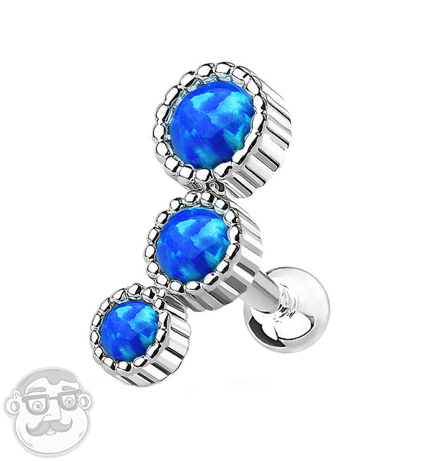 Size: 16 gauge 316L stainless steel barbell Brass opal setting NOTICE: Brass is not meant for long term wear. May oxidize under certain moisture conditions Synthetic opalite gems Bar length is 1/4". Height is: 10mm Ball: 3mm