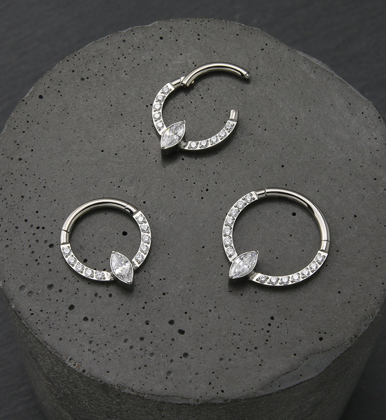 Ovoid Row CZ Titanium Hinged Segment Ring
