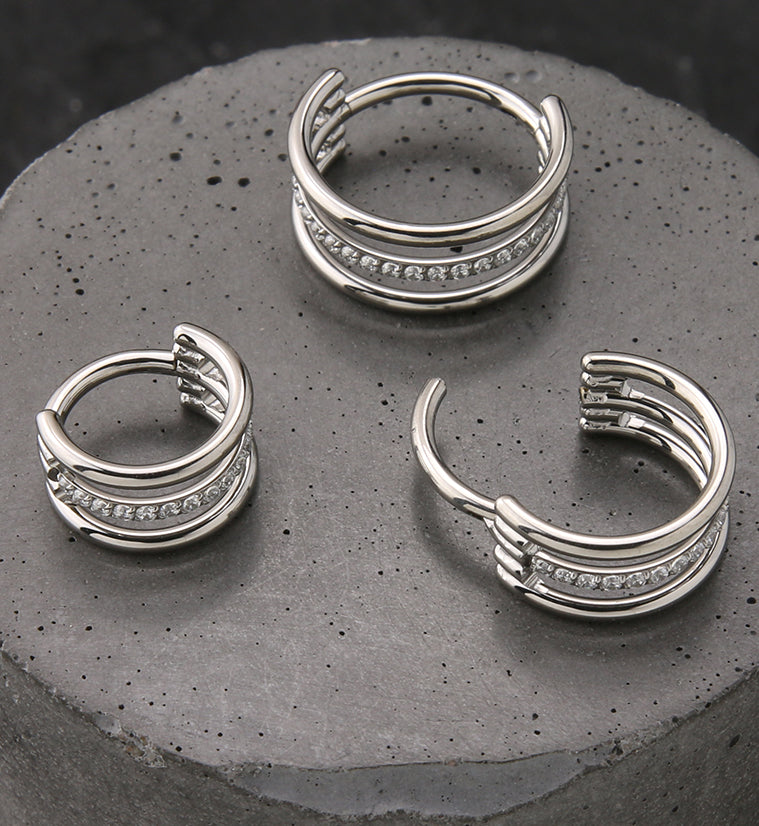 Triple Interval CZ Row Titanium Hinged Segment Ring