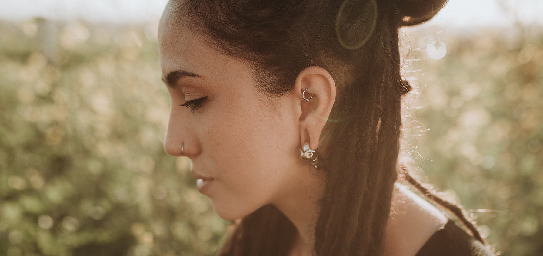 Congrats On Your Rook Piercing! Here Are 6 Ways to Reduce Healing Time & Stress