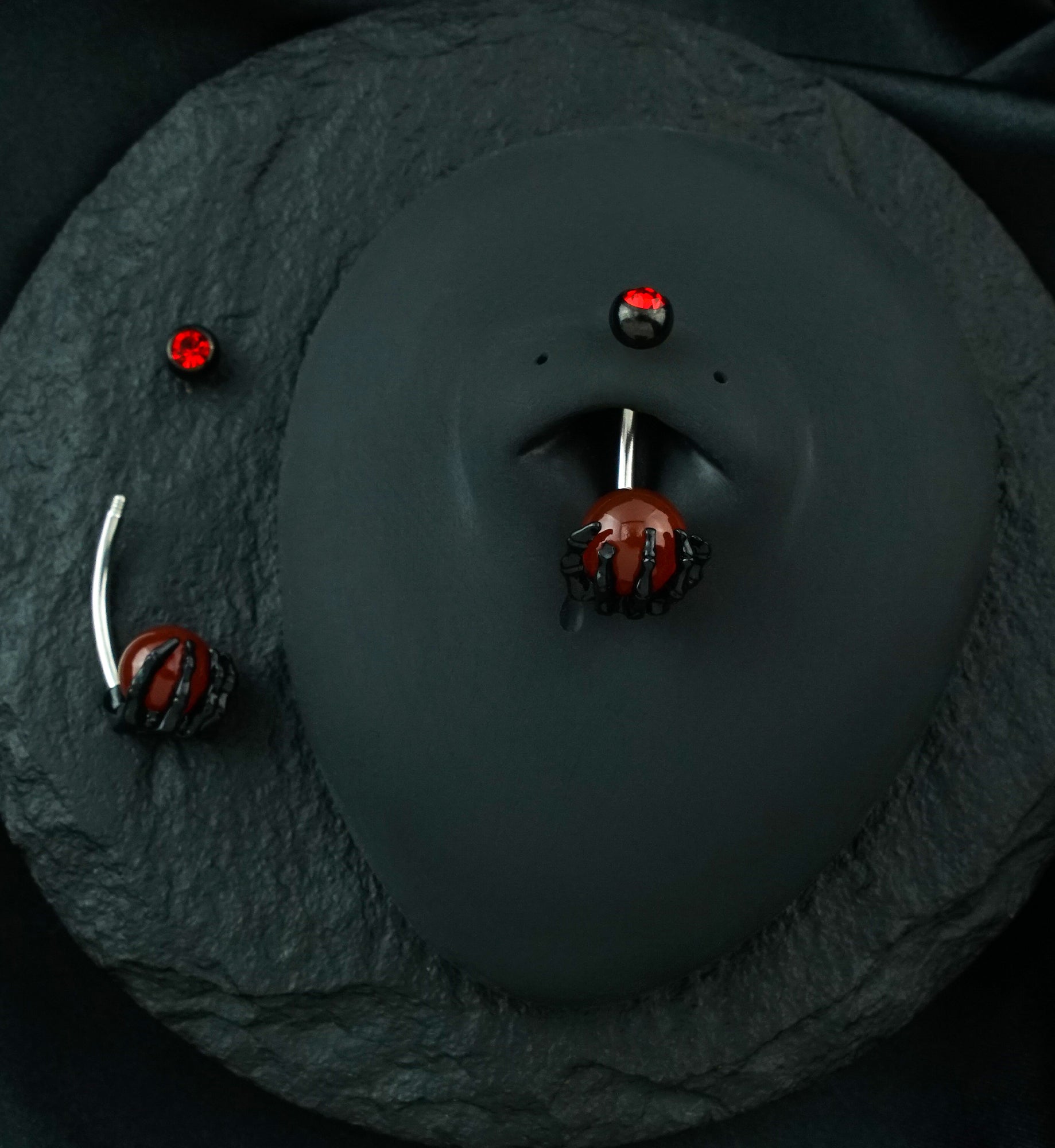 Black PVD Skeletal Palm Red Agate Belly Button Ring