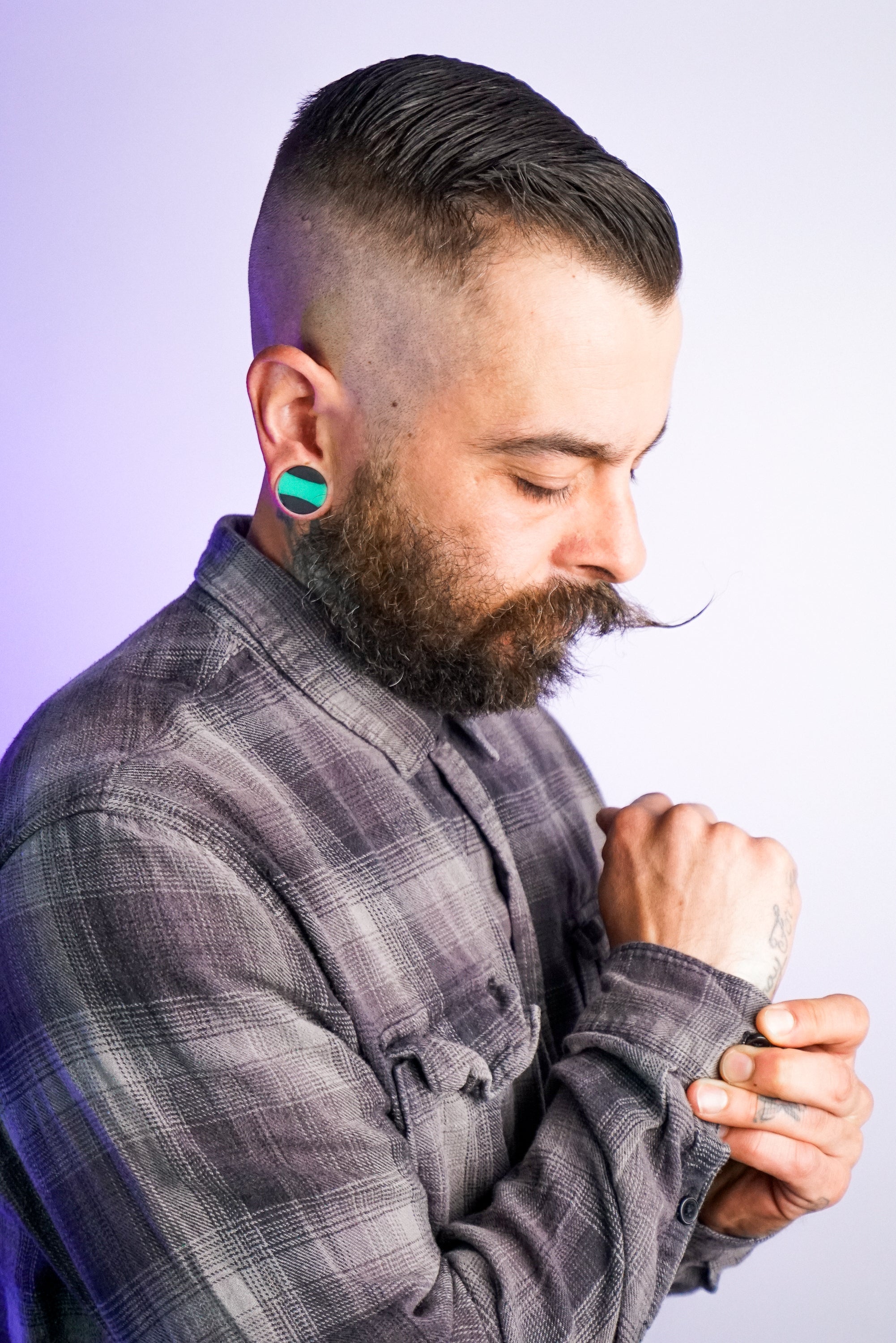 Emerald And Black Double Flare Silicone Plugs