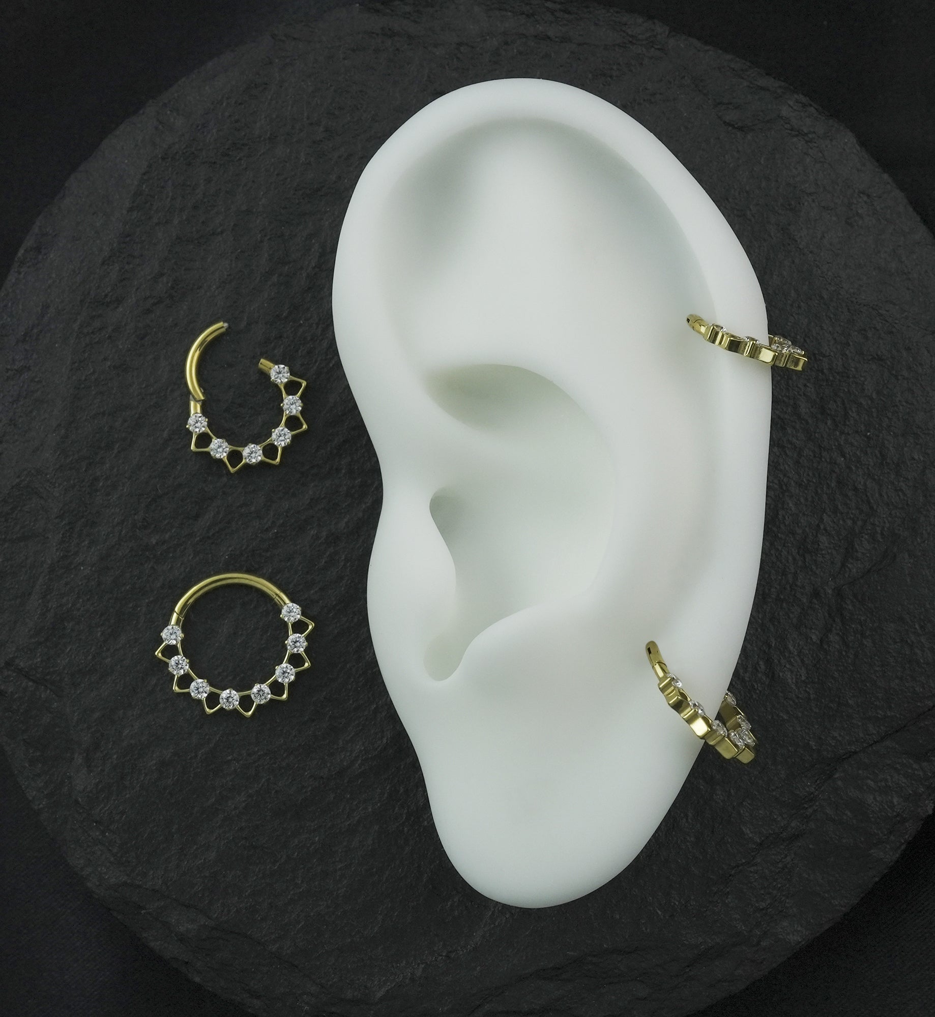 Gold PVD Alternate Triangle Clear CZ Titanium Hinged Segment Ring