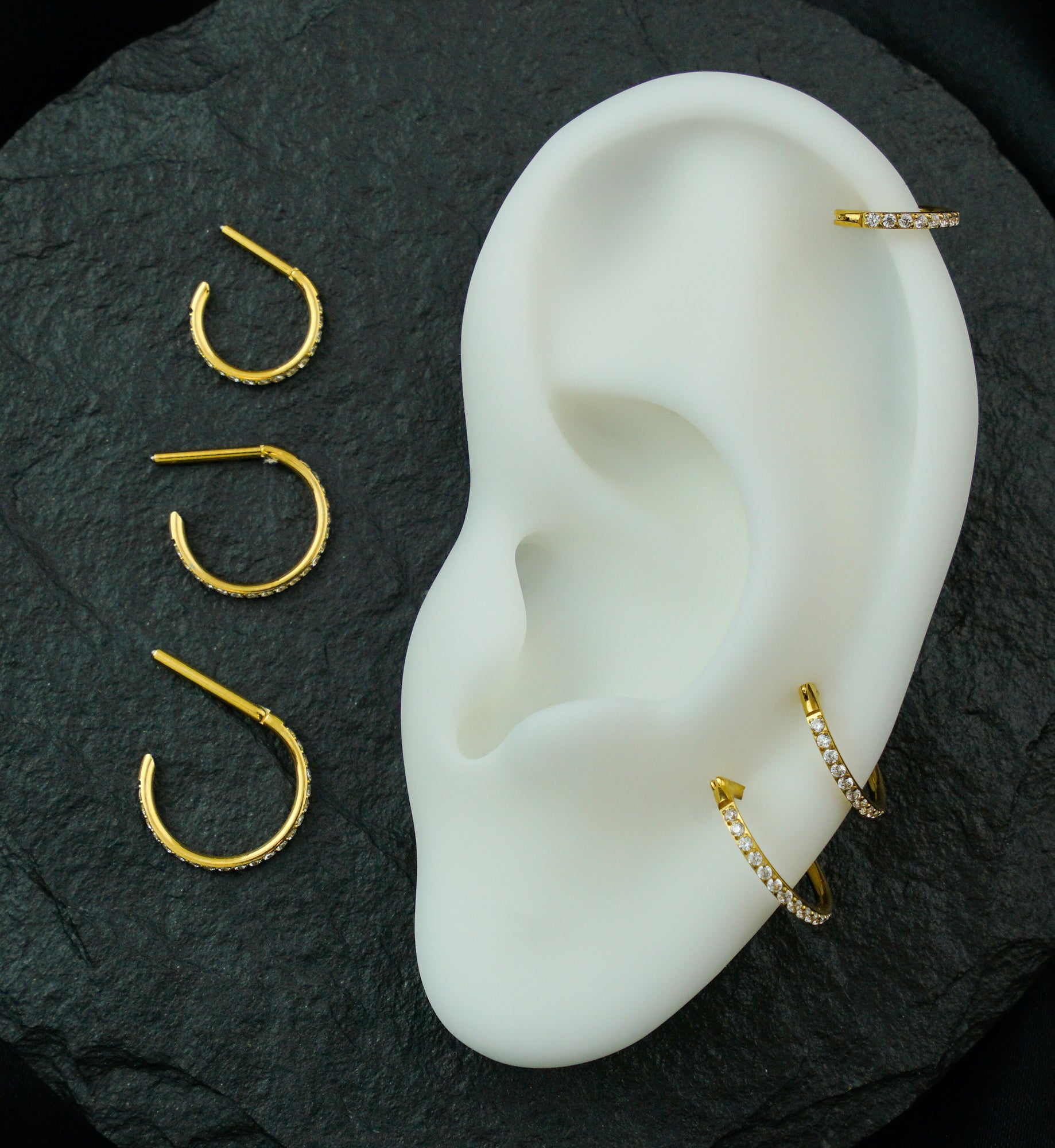 Gold PVD Outward Facing Deca Clear CZ Titanium D-Shaped Hinged Segment Ring