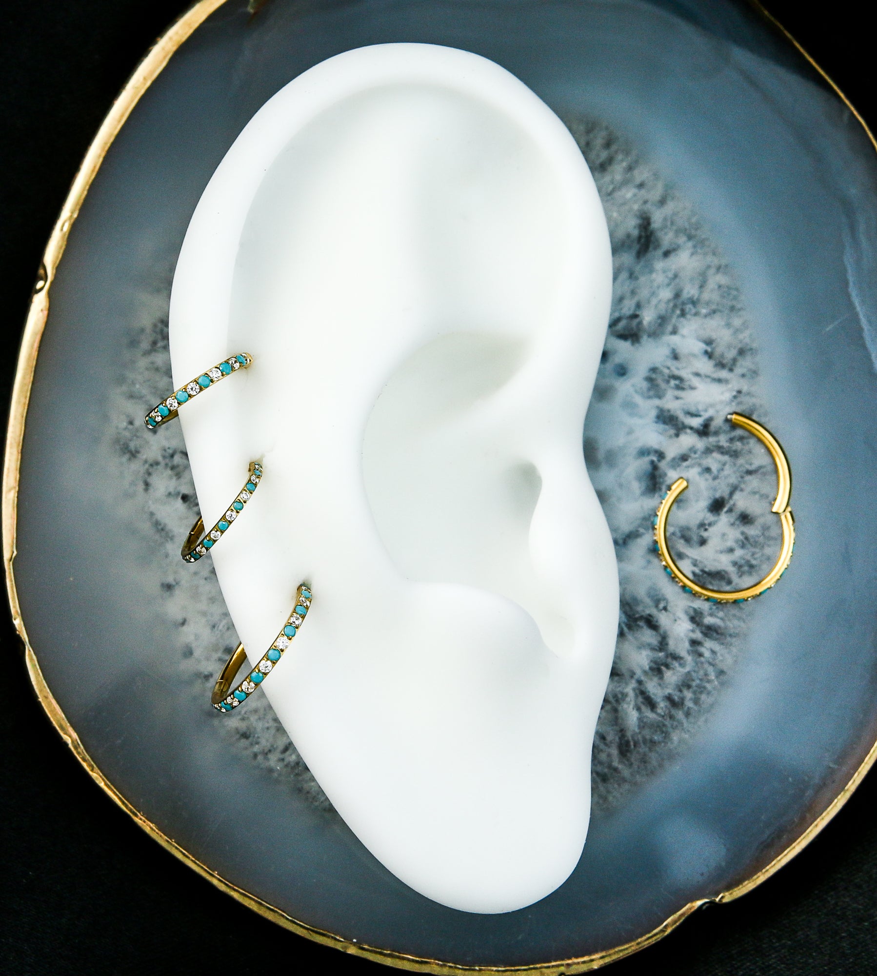 Gold PVD Side Facing Clear CZ Turquoise Titanium Hinged Segment Ring