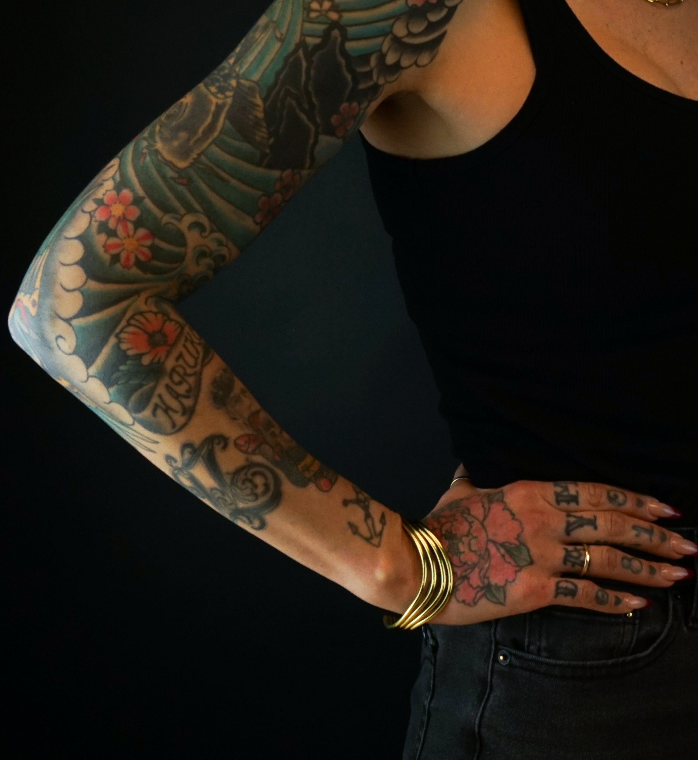 Quadruple Swerve Brass Bangle