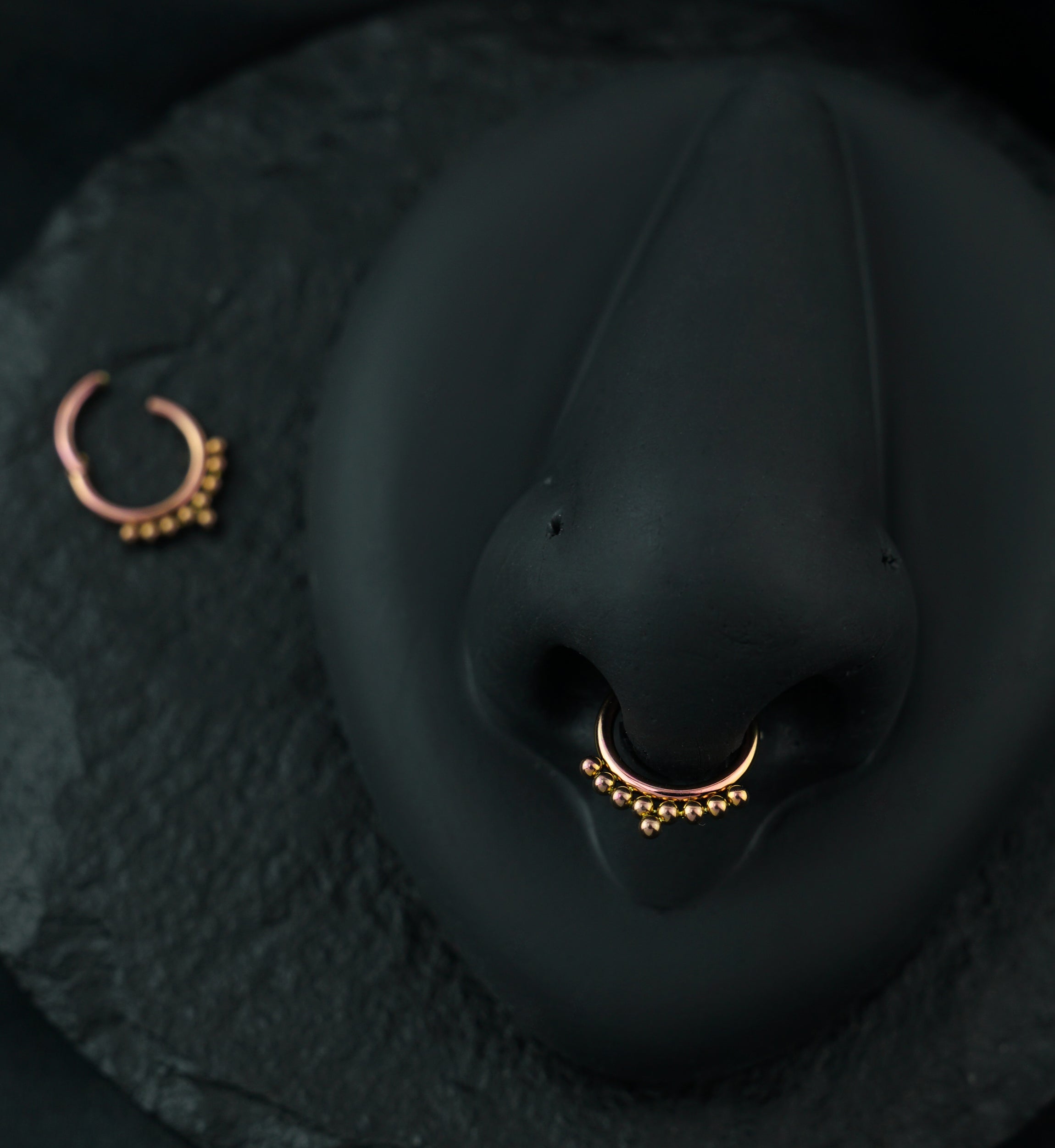 Rose Gold Anodized Beaded Row Hinged Segment Ring