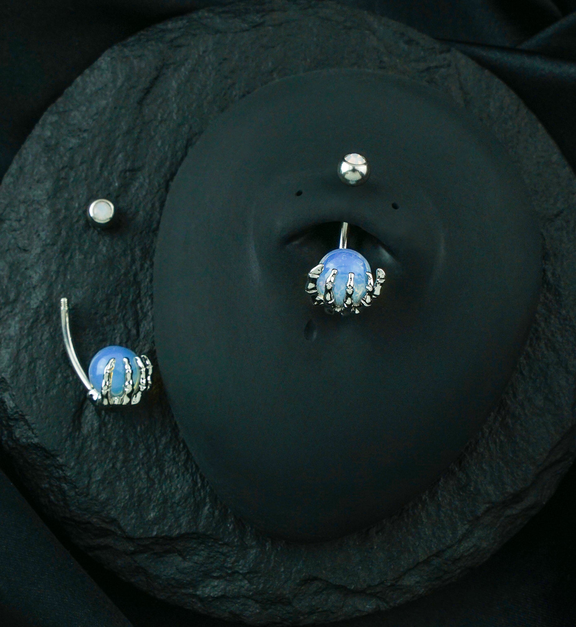 Skeletal Palm Gem Belly Button Ring