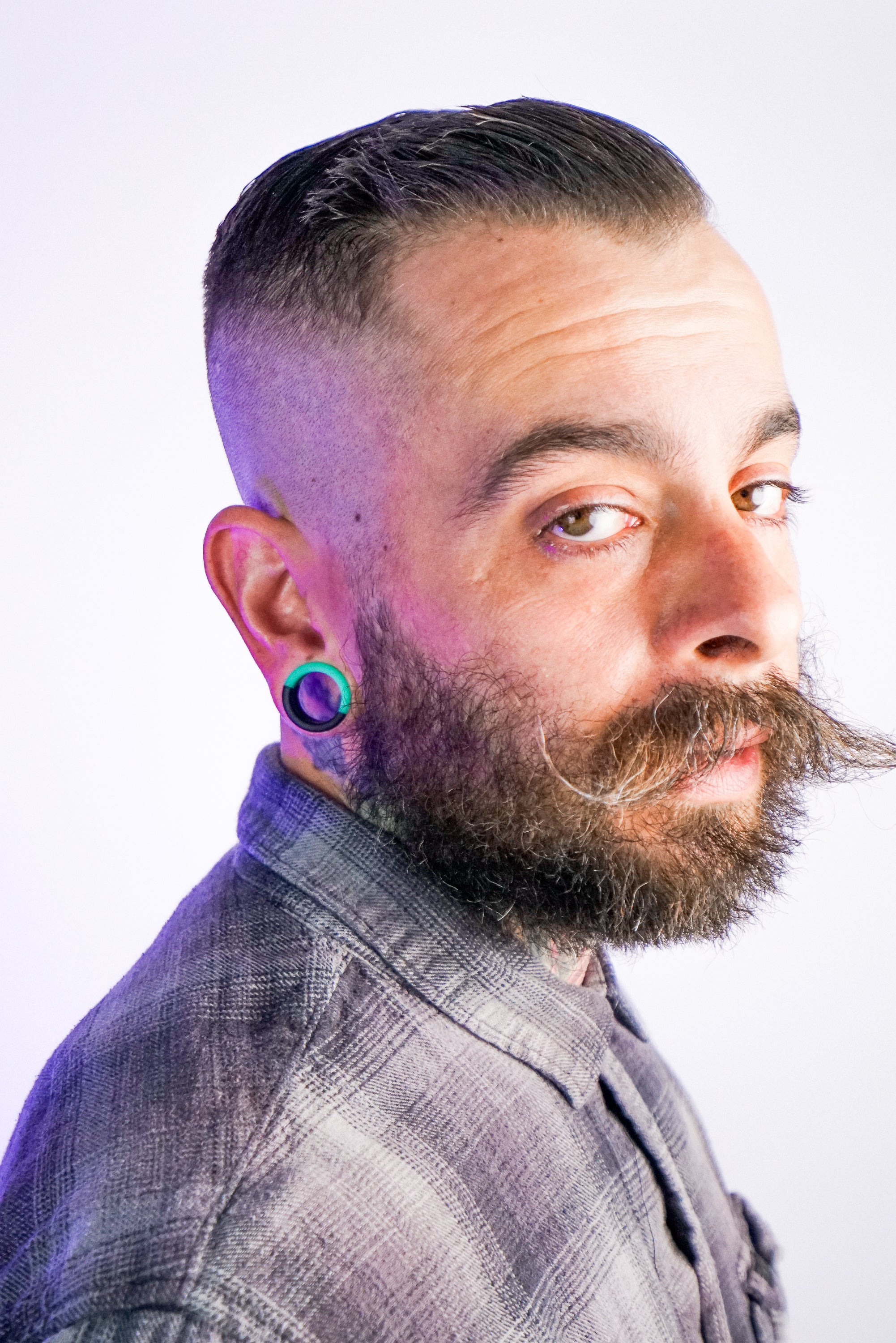 Teal And Black Double Flare Silicone Tunnel Plugs