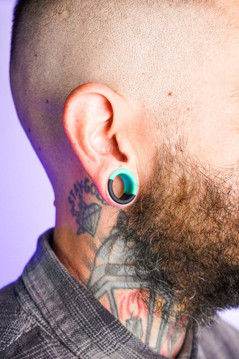 Teal And Black Double Flare Silicone Tunnel Plugs