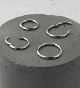 Facet CZ Titanium Hinged Segment Ring