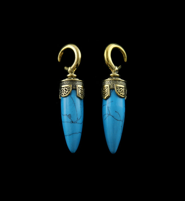 Sold in pairs  (2pc) 8G or bigger to wear Height: 55mm Width: 12mm 9 grams each Howlite stone Made of brass Brass is not meant for long term wear  May oxidize under extreme moisture conditions